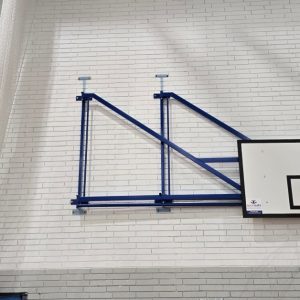 Basketball on sports hall wall