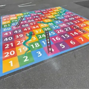Multi-coloured snakes and ladders on a playground