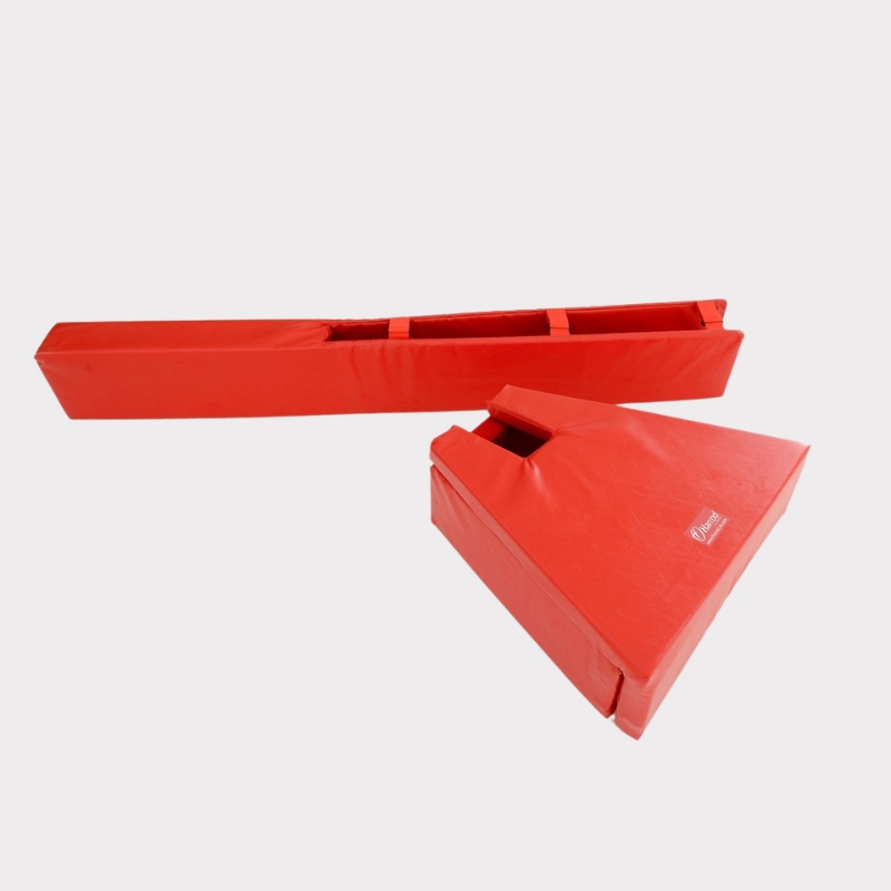Bright red, wedge-shaped foam tackle shield on a light gray background. Curved cutout at the top; a logo is visible. Durable, athletic equipment.
