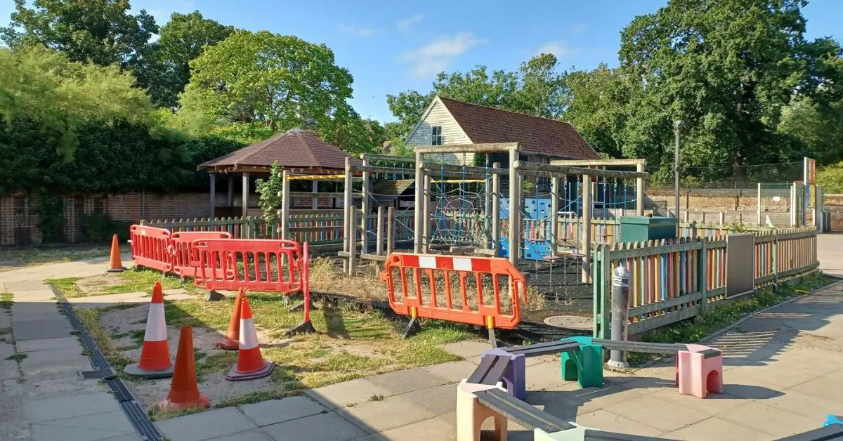 Fenced off play equipment